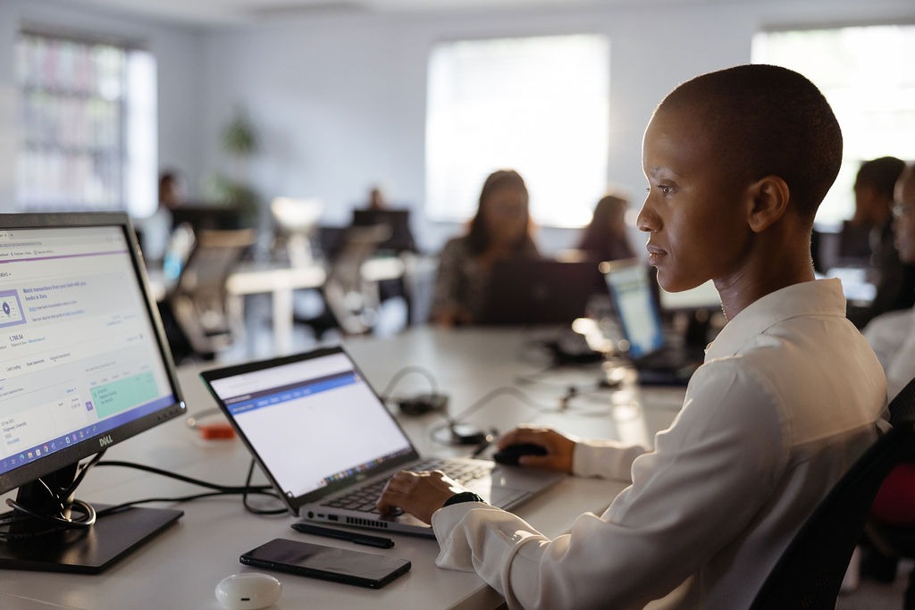 Accountant doing bookkeeping and payroll,Add an image with your Focus Keyword as alt text.