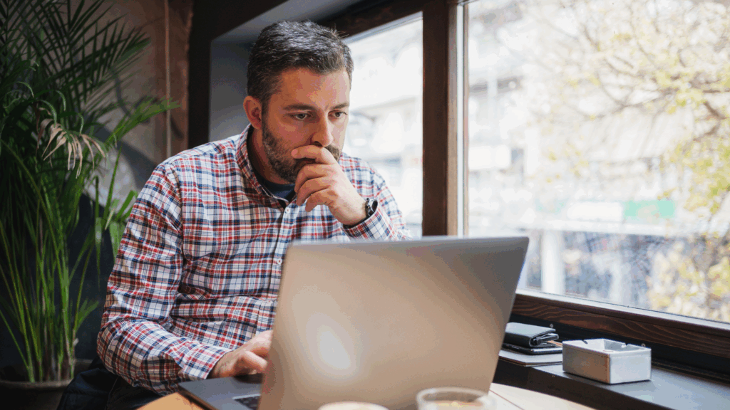 ntario small business owner reviewing a financial budget with an accountant