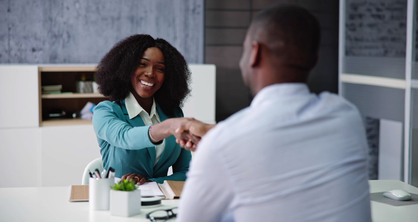 Client shaking accountant's hand