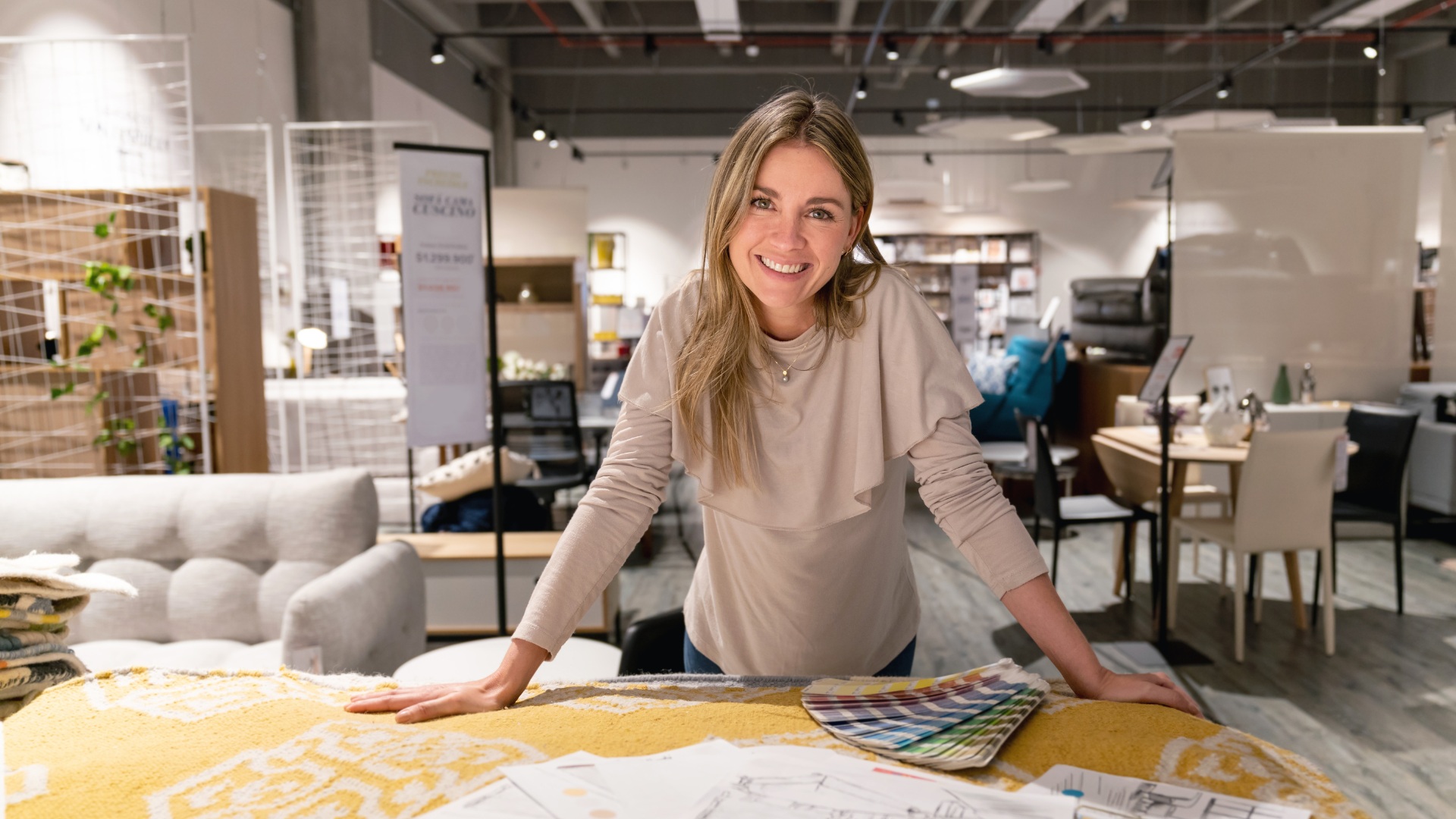 Woman examining design materials in store.Accountant Xero London Ontario providing expert Xero setup and support for local businesses.